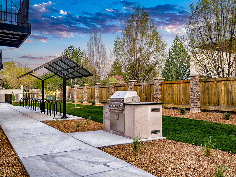 The Ivywild - fenced and spacious courtyard complete with a built-in gas grill, covered bike storage, and a pet exercise area